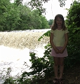 canoeing - klea standing by old mill dam behind factory outlets in sturbridge on quinebaug river